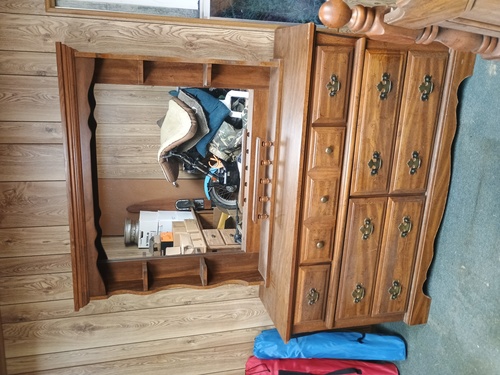 Bed headboard, chest with mirror, bed rails.  No mattress 