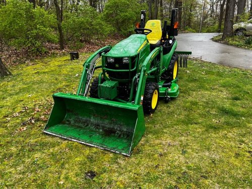 John Deere tractor w/loader mid mower and rake