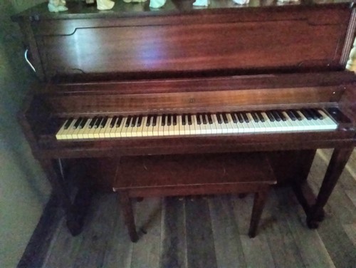 Console piano with bench